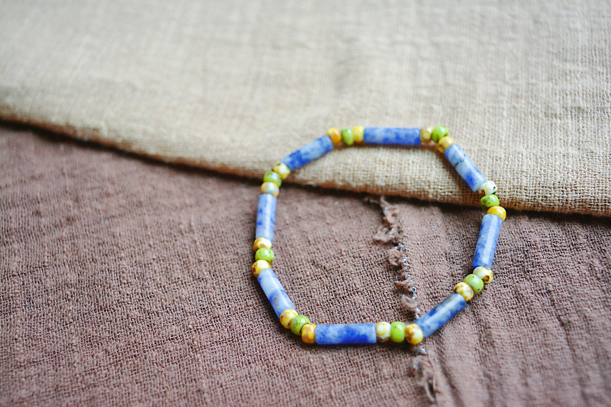 Traces of Sunlight | Picasso Beads & Blue-White Cylinder Bracelet