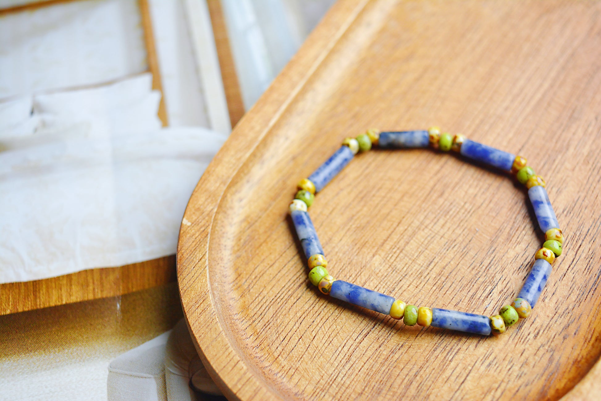 Traces of Sunlight | Picasso Beads & Blue-White Cylinder Bracelet